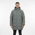 Man wearing a gray puffer coat on a white background
